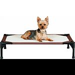 A fleecy, comfortable, self-warming pet cot - material returns a pet s body heat Holds up to 150 pound dogs